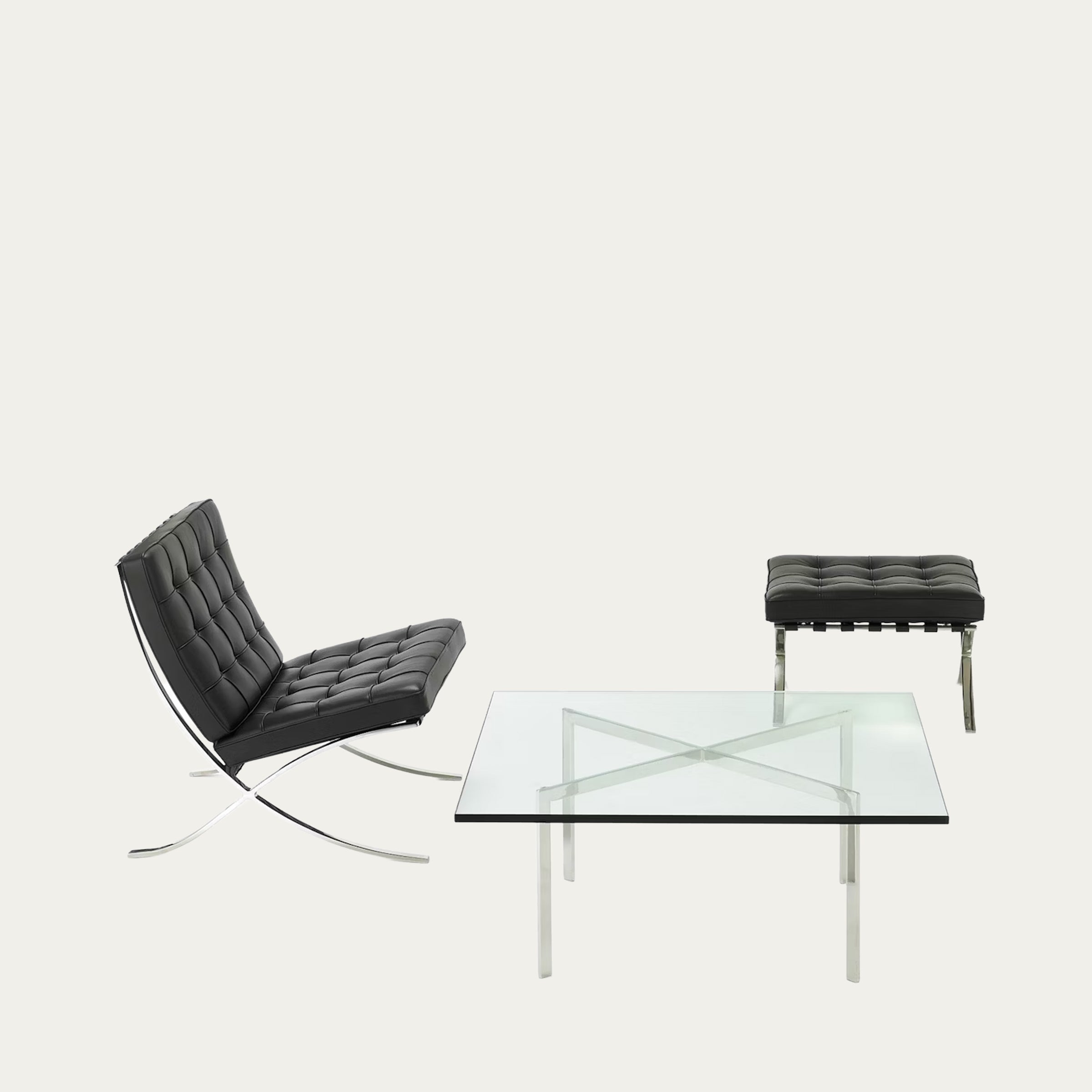 Set aus schwarzem Barcelona Chair, passendem Hocker und Glastisch von Mies van der Rohe – modernes ikonisches Lounge-Ensemble