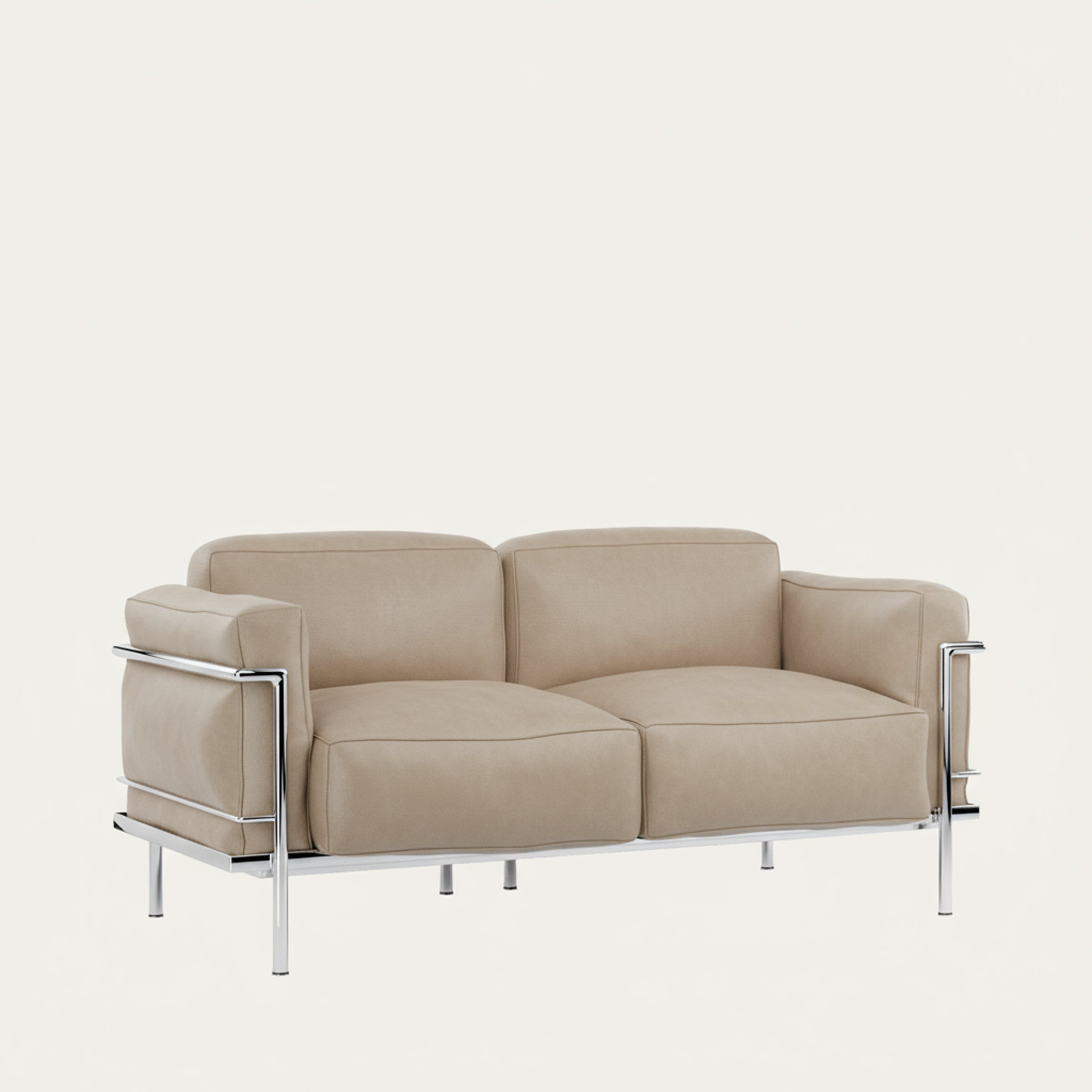 Beigefarbenes Grand Confort 2-Sitzer Sofa von Le Corbusier mit verchromtem Stahlgestell in frontaler Ansicht
