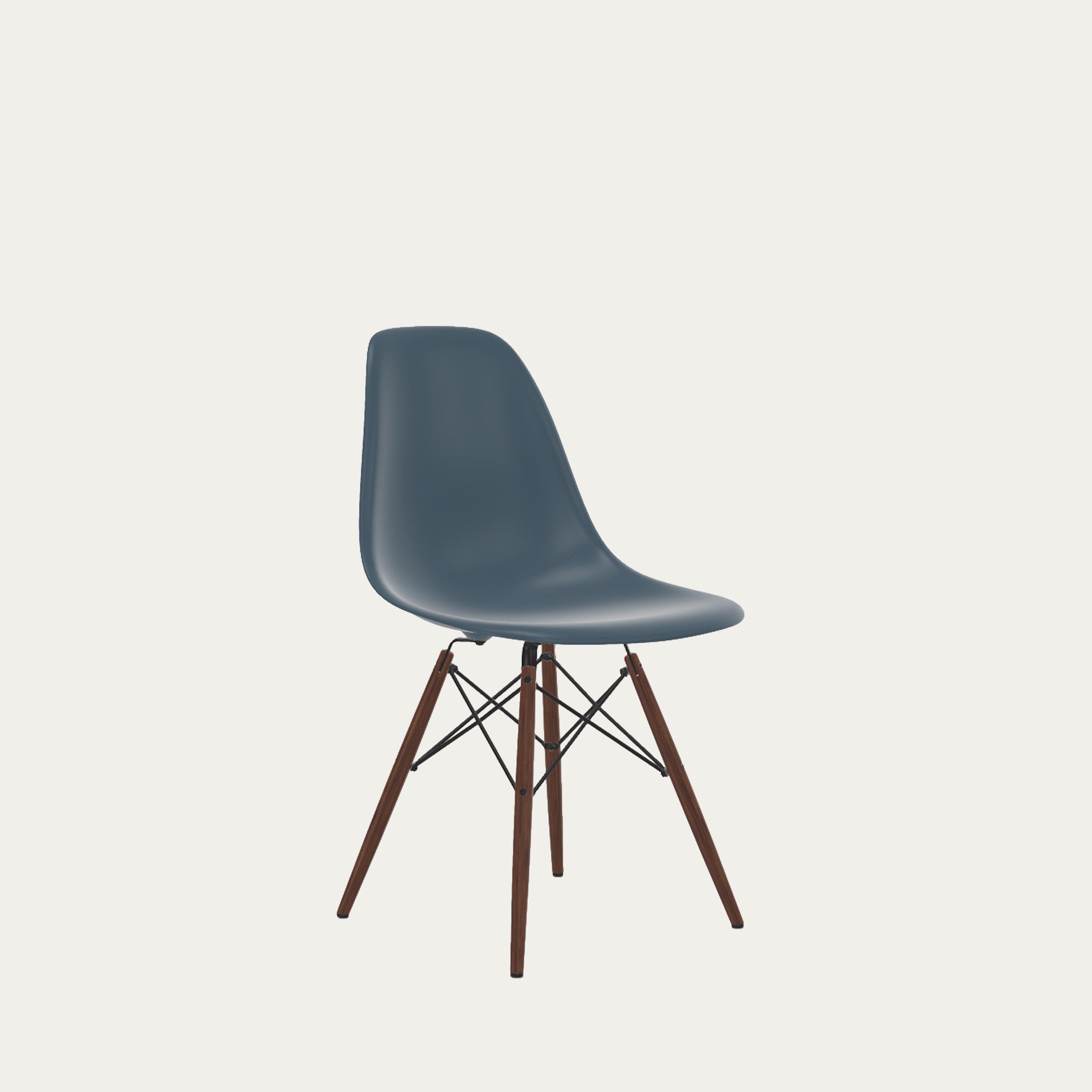 Moderner DSW Stuhl von Charles & Ray Eames (1950) mit blauer Sitzschale, filigranes Holzgestell und schwarzer Metallverstrebung