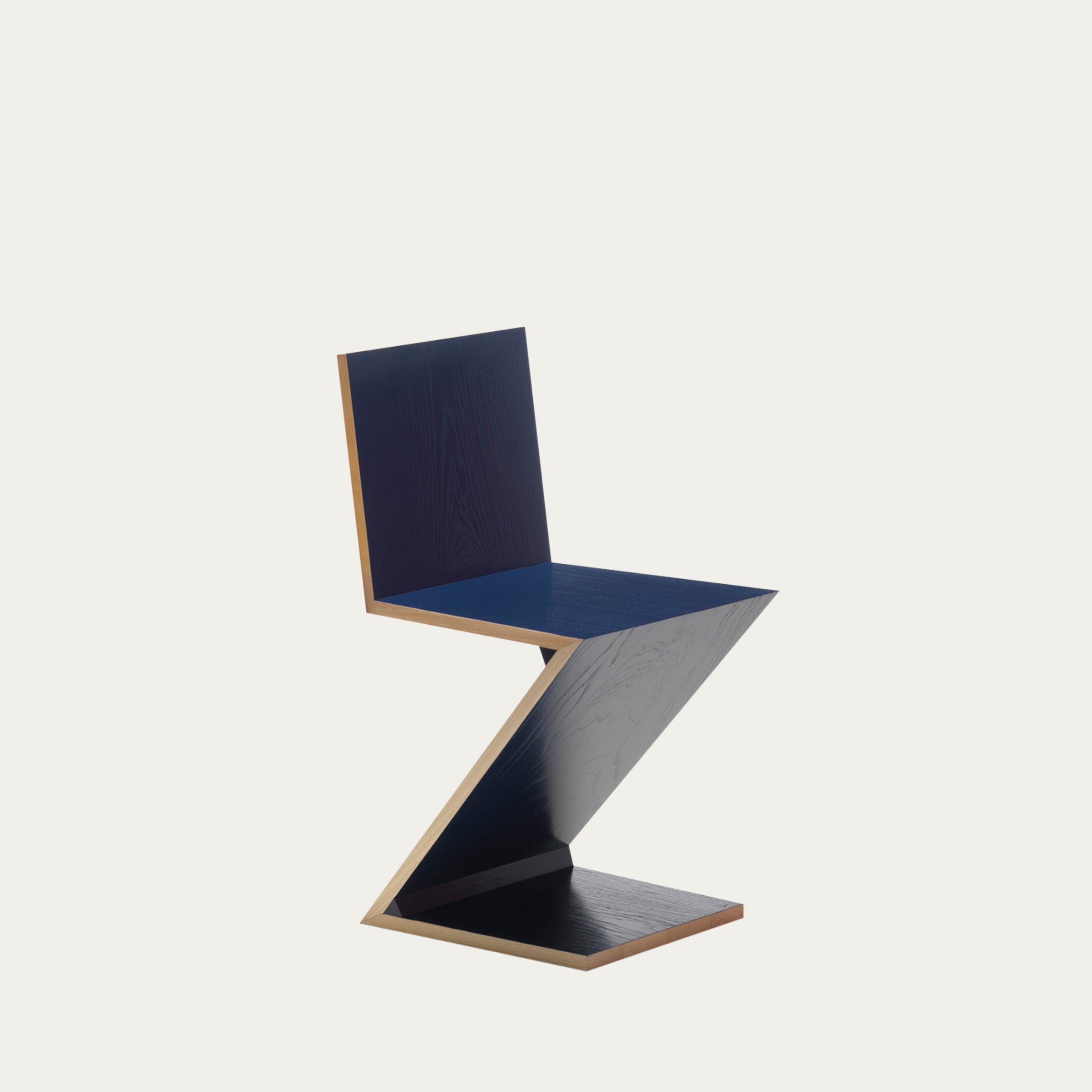 Dunkelblauer Zig Zag Stuhl von Gerrit Thomas Rietveld – minimalistischer Z-förmiger Holzstuhl aus dem Jahr 1934